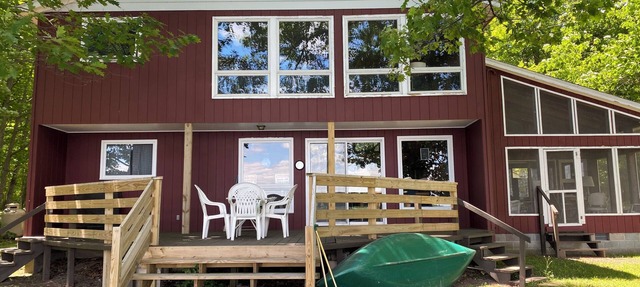 Clean, Rustic 4-bedroom cabin nestled in the woods in Sackets Harbor in Sackets Harbor