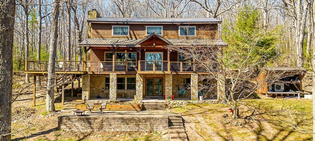 Lake Time | Incredible Interior, Cozy Family Room, Dock, & Fire Pit! in Swanton
