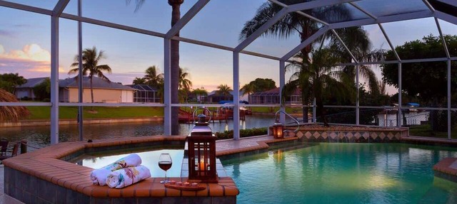 Pretty Waterfront Home w/Heated Pool/Spa + Tiki in Cape Coral