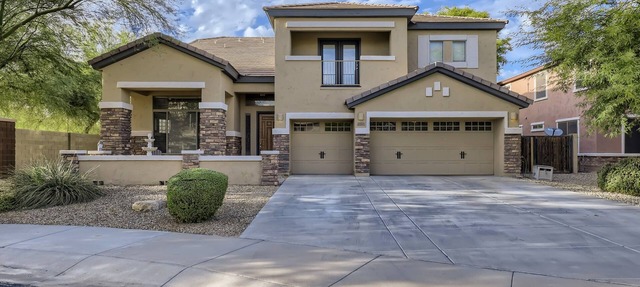 Spacious home in the heart of the West Valley with heated pool and game room in Goodyear
