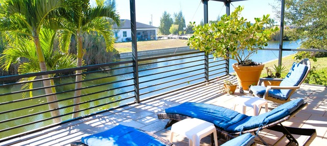 Waterfront home with oversized heated pool & spa, bikes, beach gear! in Cape Coral